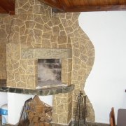 Facing furnaces with artificial stone
