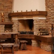 Facing a fireplace with artificial stone: what is needed and how to do it