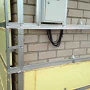 We conduct insulation of the external walls of a brick house