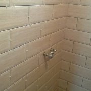 How to prepare a wall for laying tiles (part 1): we cover the shower room with the master