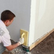 Plastering walls with cement mortar according to technology