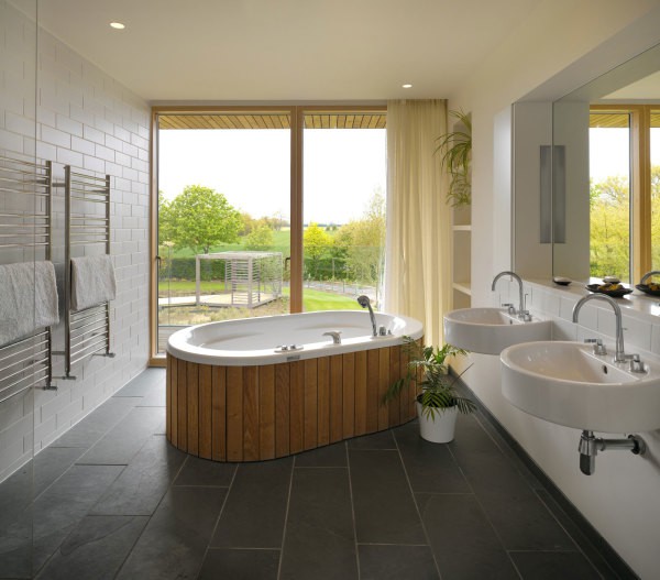 Option for a spacious bathroom: brick tiles and plasterboard with painting