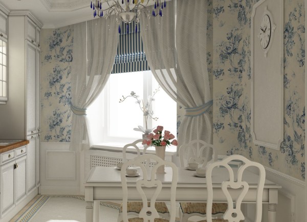 Papier peint à délicates fleurs bleues sur une cuisine blanche dans le style provençal