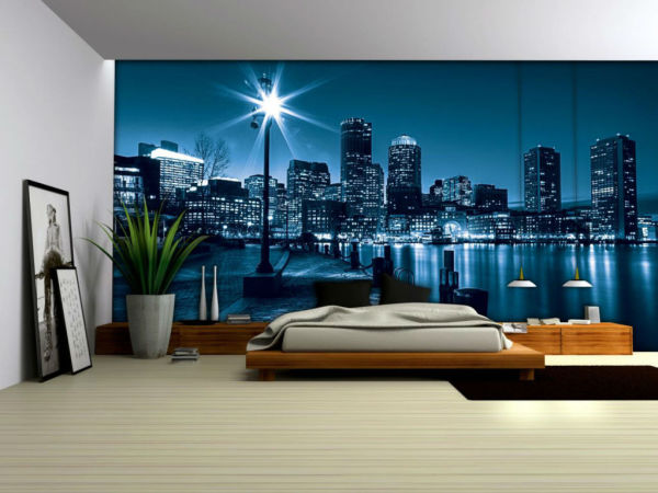 Des peintures murales fluorescentes à l'intérieur d'une chambre moderne peuvent remplacer l'éclairage nocturne et créer une atmosphère romantique dans la pièce