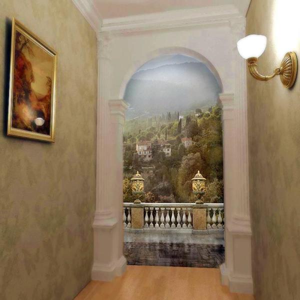 Fresque murale représentant une vue depuis un balcon d'une ville de montagne, décorera un couloir vide