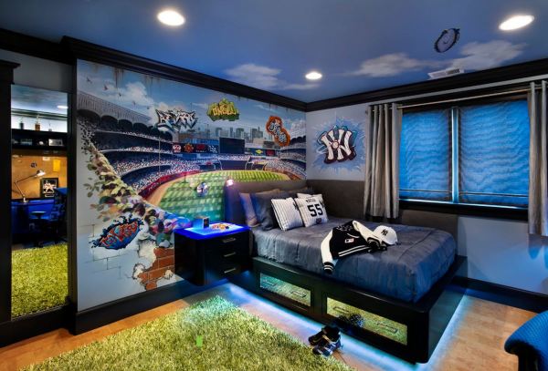Sur la photo, une murale du terrain de football dans le style des graffitis pour l'intérieur d'une chambre d'enfant