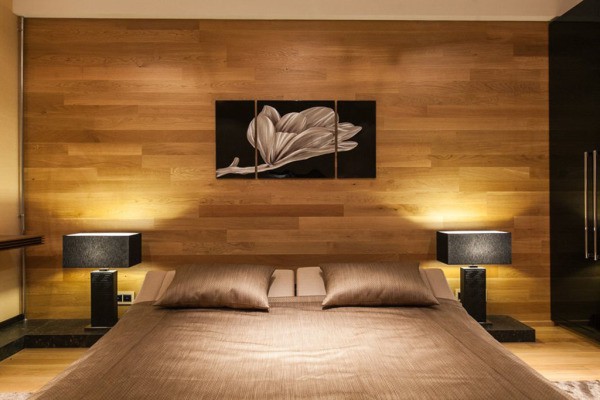 Les panneaux à base de bois pour les murs peuvent ajouter de la chaleur et de l'intimité à n'importe quelle pièce, ils ont l'air très bien à la fois dans la chambre et dans la cuisine
