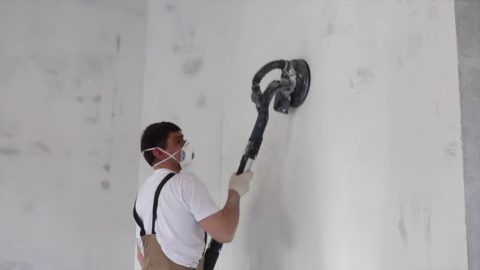 Grinding plasterboard wall for painting