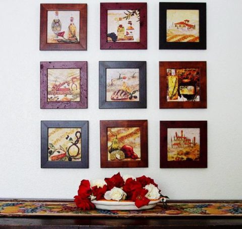Decoration of the wall with pictures in the frame of natural wood