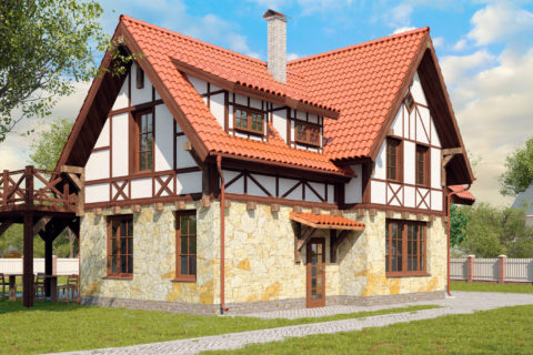 Hus i Fachwerk-stil med stenbund