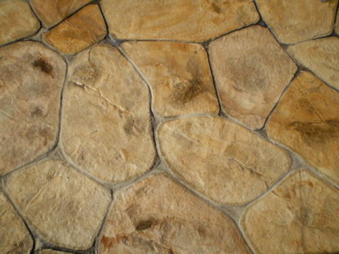 Pelaksanaan batu plaster dalam bentuk batu semula jadi